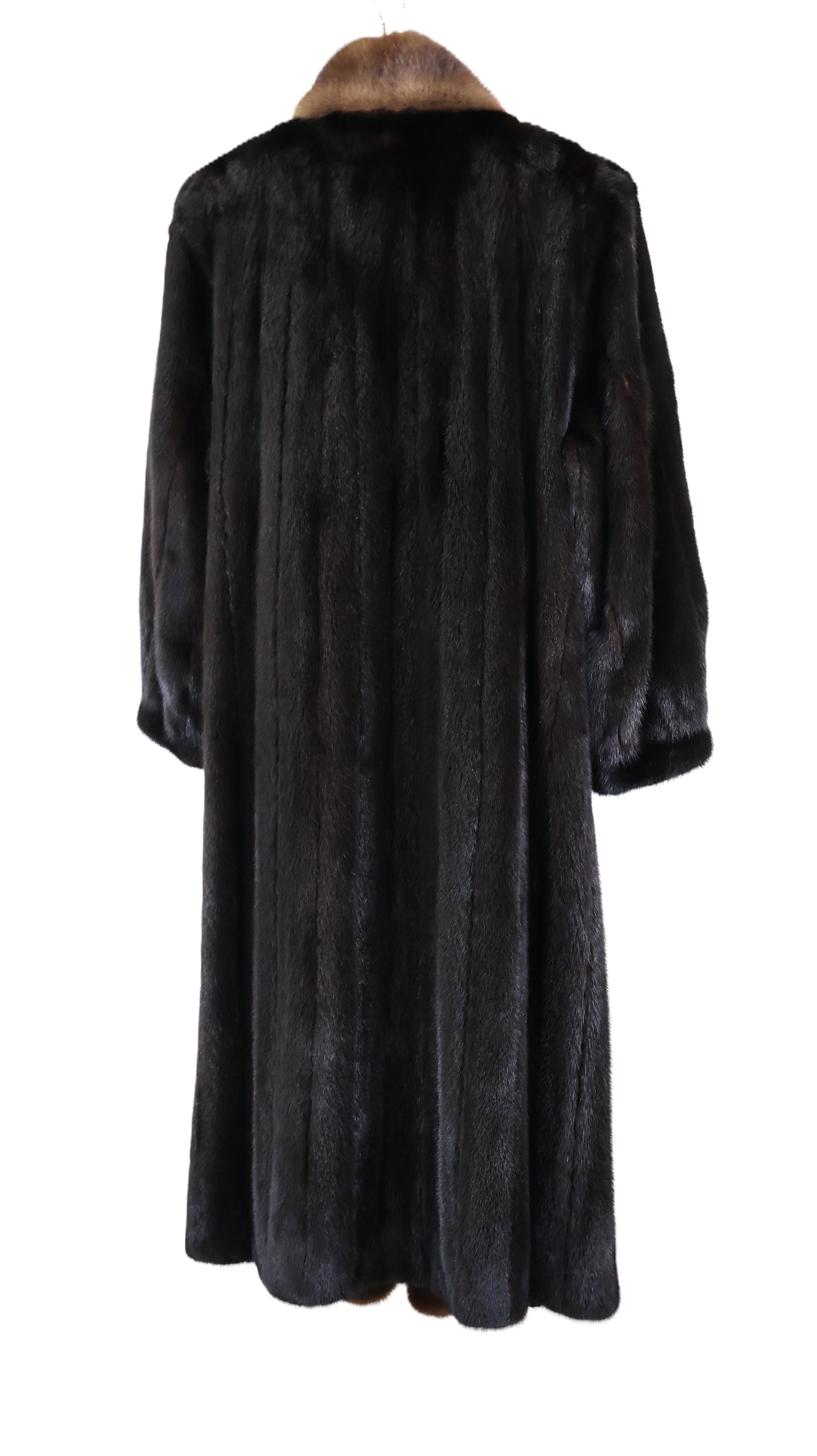 PRE-OWNED BLACK DYED MINK COAT W/ DEMI BUFF MINK CROSS CUT TUXEDO FRONT & BRACELET CUFFS