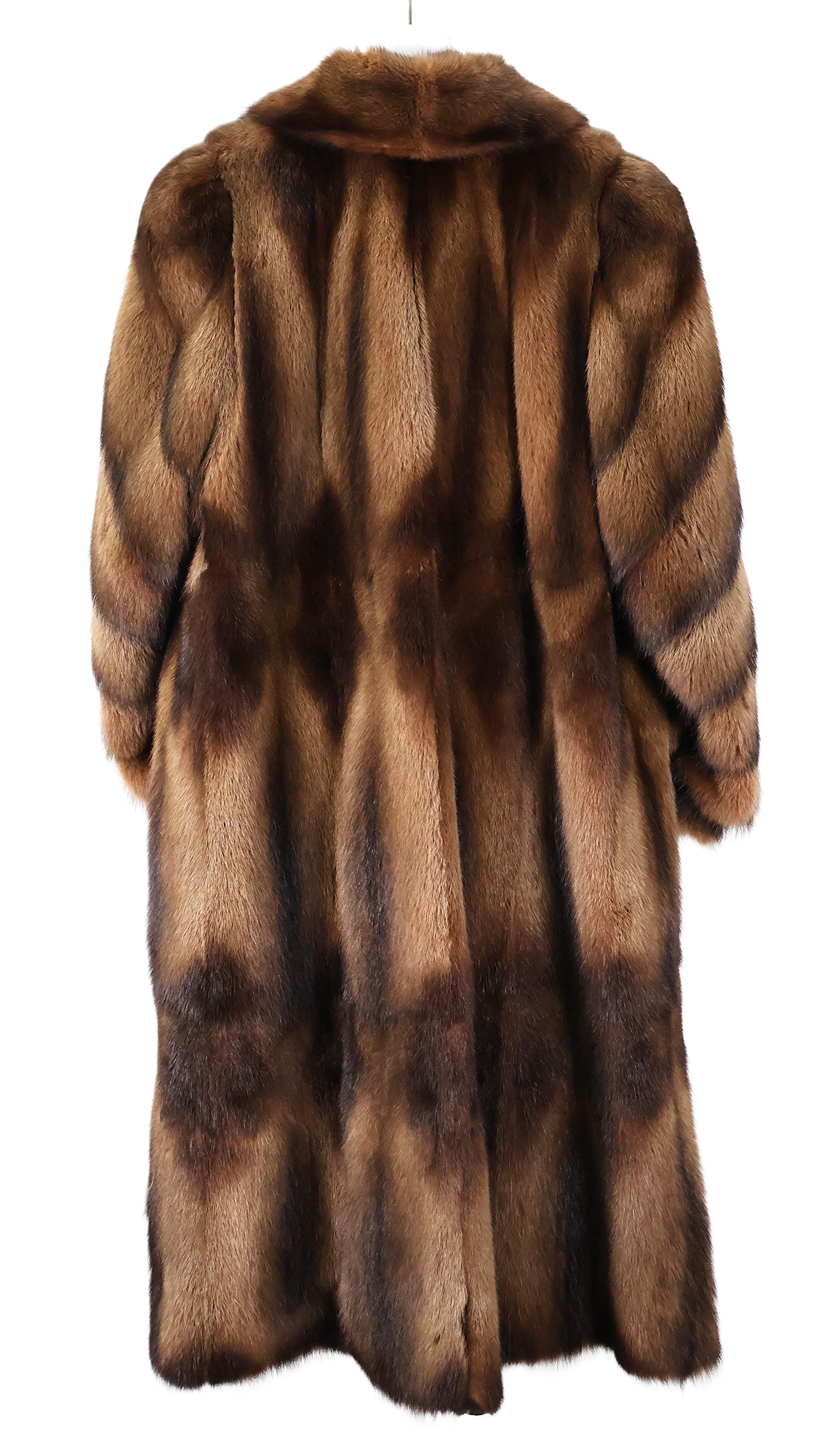 PRE-OWNED BROWN DYED PANELLED FITCH COAT W/ WING COLLAR, DIAGONAL SLEEVES & BANDED CUFFS