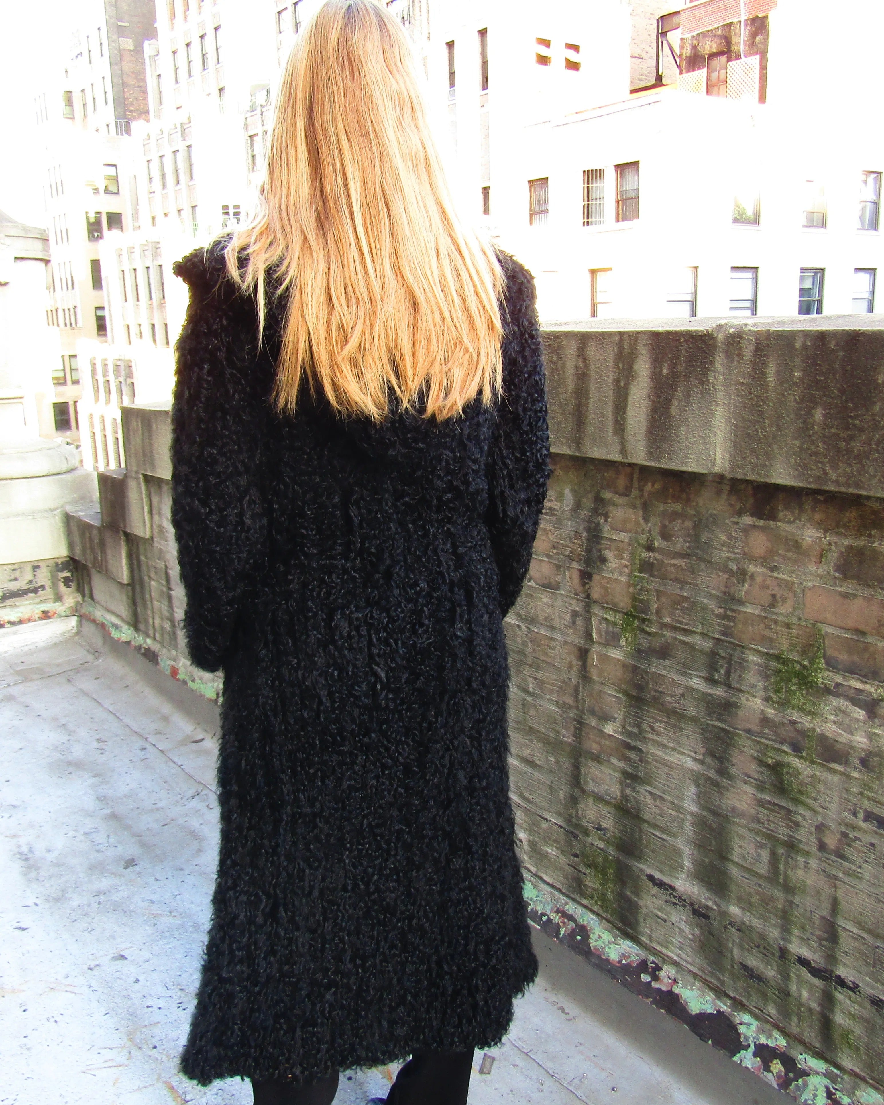 BLACK DYED CURLY LAMB KNITTED HOODED COAT