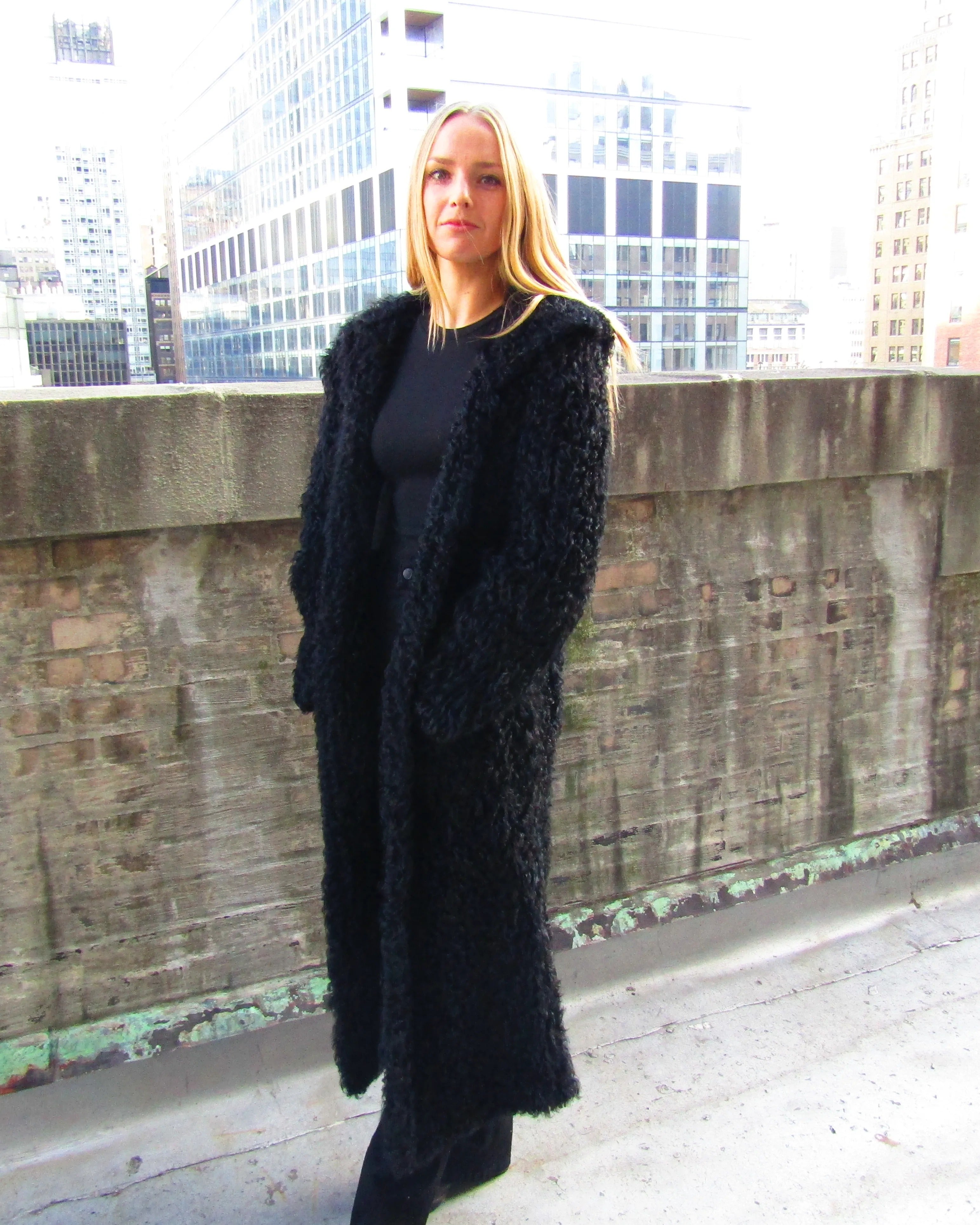 BLACK DYED CURLY LAMB KNITTED HOODED COAT