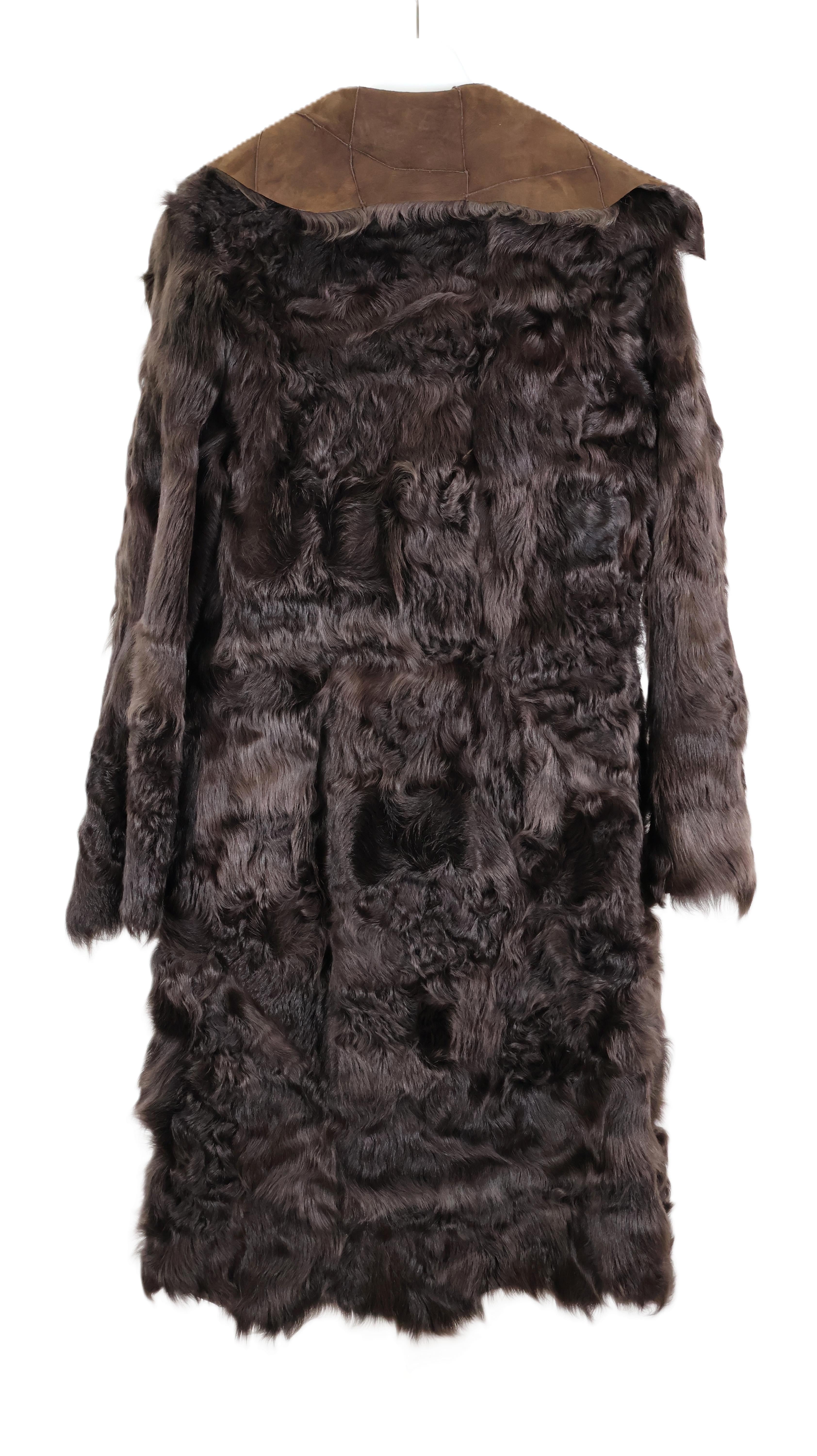 PRE-OWNED BROWN NAPA LAMB REVESIBLE 7/8. RAW EDGE SLEEVE & HEM W/ ASSYMETRICAL COLLAR