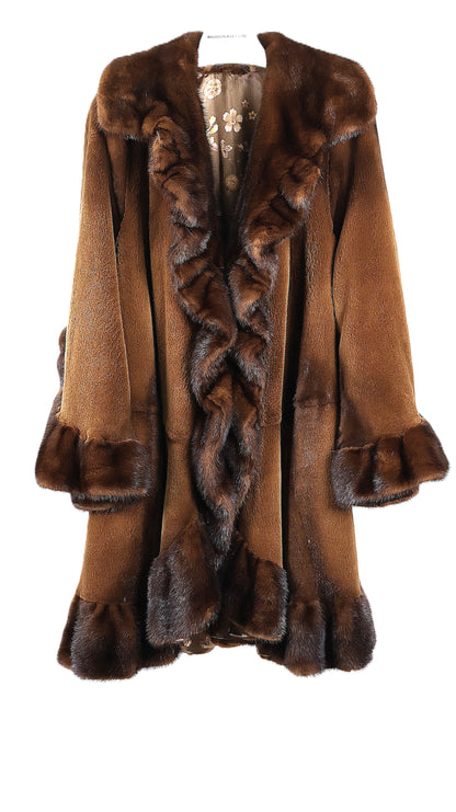 PRE-OWNED COGNAC DYED SHEARED MINK 7/8 SWING W/ LONG HAIR MINK RUFFLED COLLAR, HEM & CUFFS