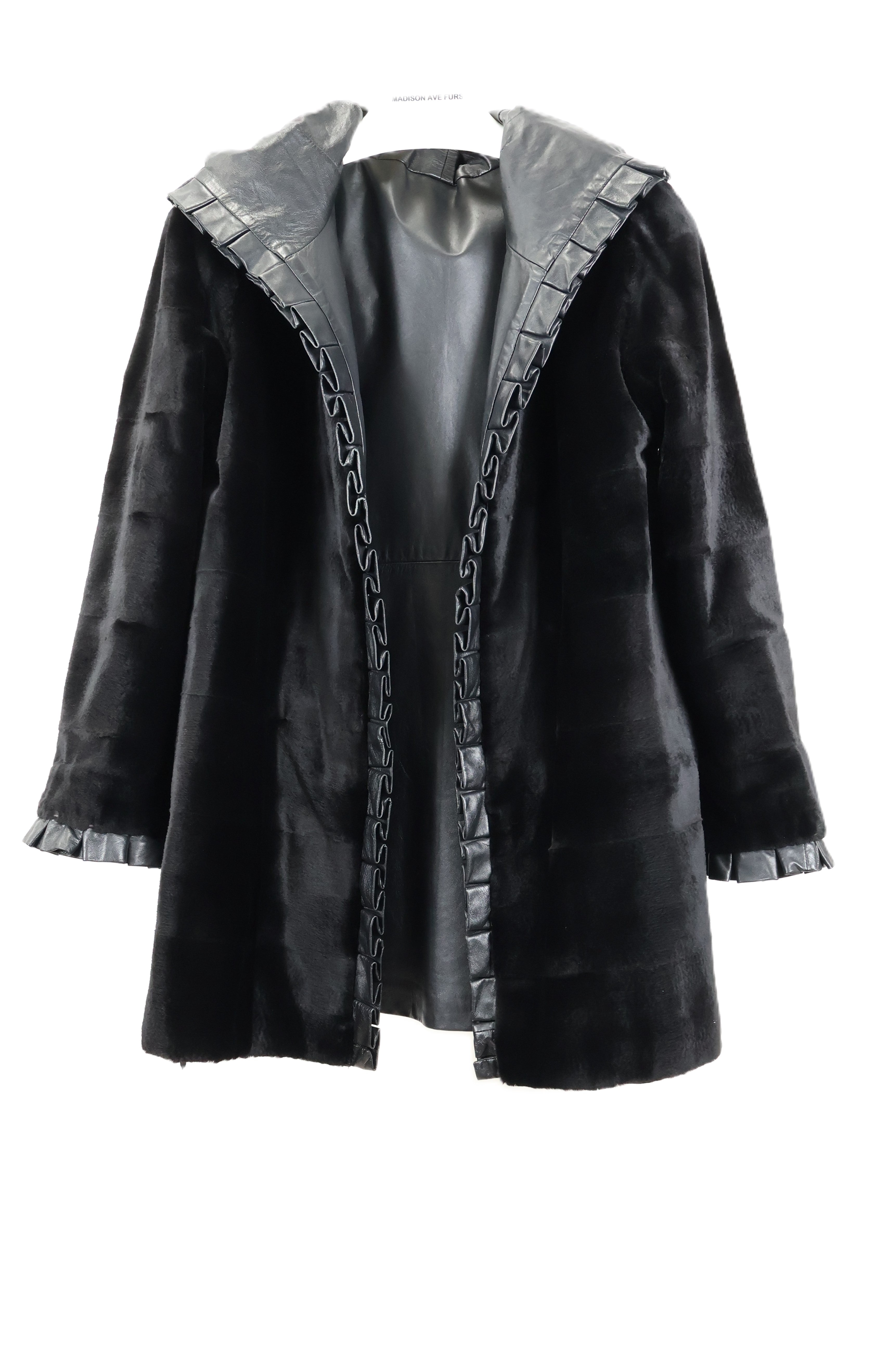 PRE-OWNED BLACK SHEARED MINK REVERSIBLE TO LEATHER HOODED STROLLER W/ STRAIGHT SLEEVES & RUFFLED EDGES